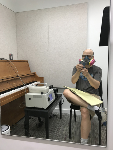 Charles Stanier in a ventilator in a music practice room
